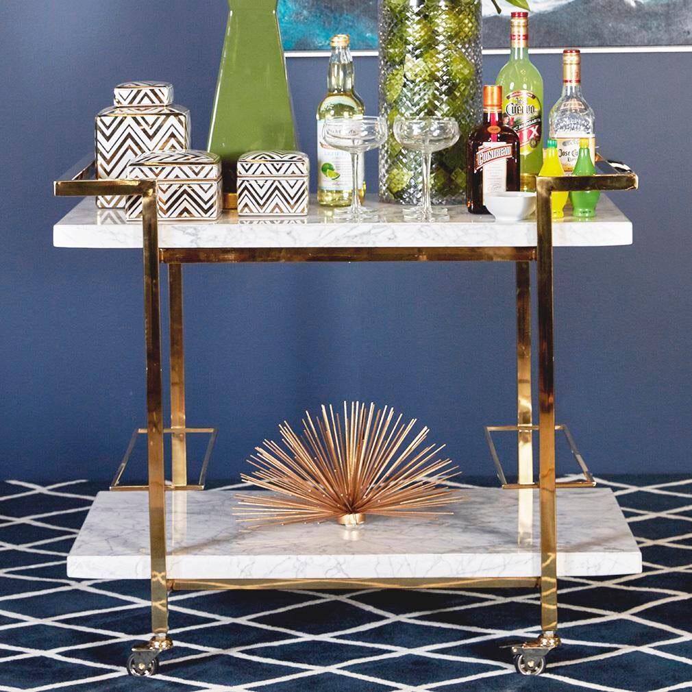 Classy gold bar cart for cocktails and drinks