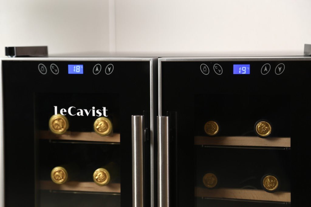 Black wine fridge with adjustable temperature panel and silver door handles