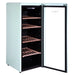 Green retro wine fridge with glass door and wooden shelves