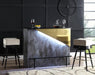 Sophisticated grey and gold bar counter in a dark bar setting